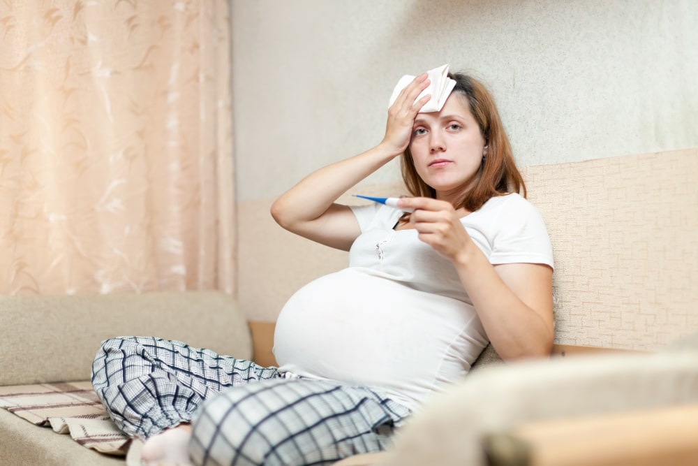 Mujer con fiebres en el embarazo